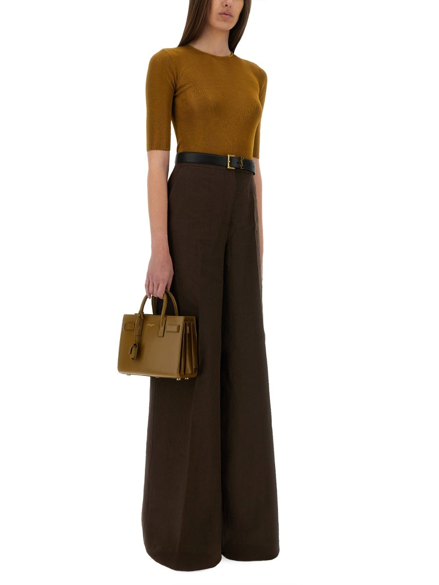 Saint Laurent Women Top "Cassandras"