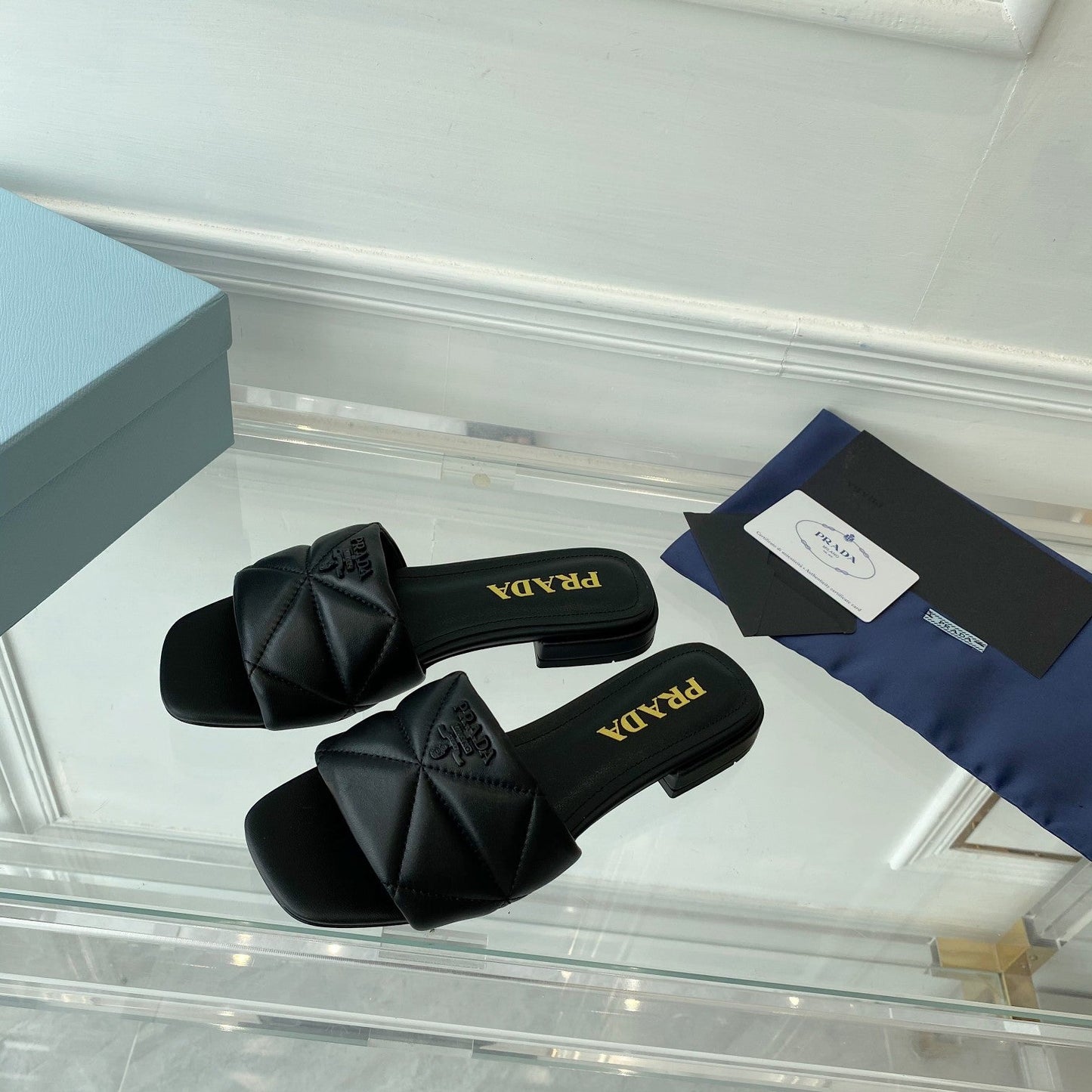 PRADA Slide 25 Quilted Black leather