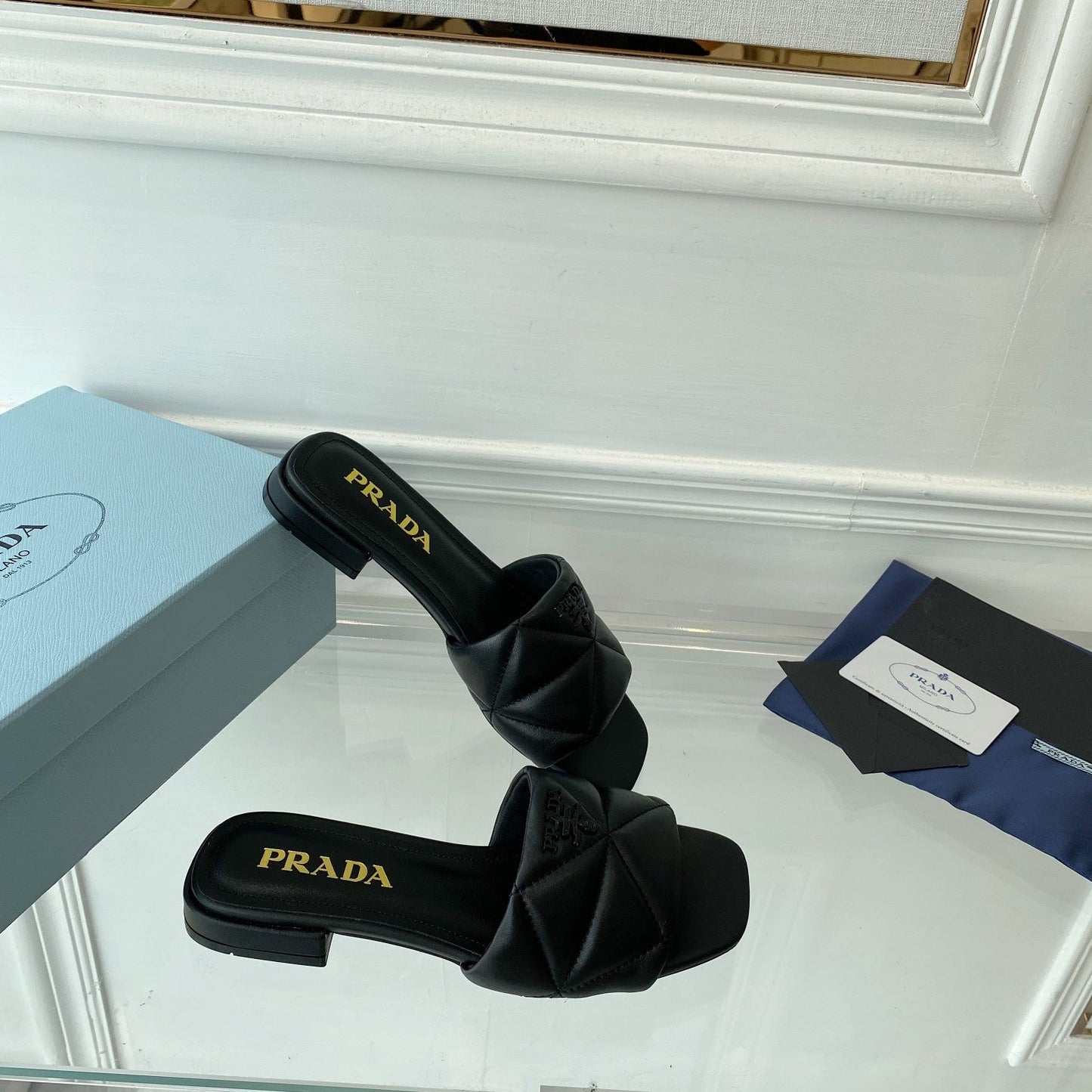 PRADA Slide 25 Quilted Black leather