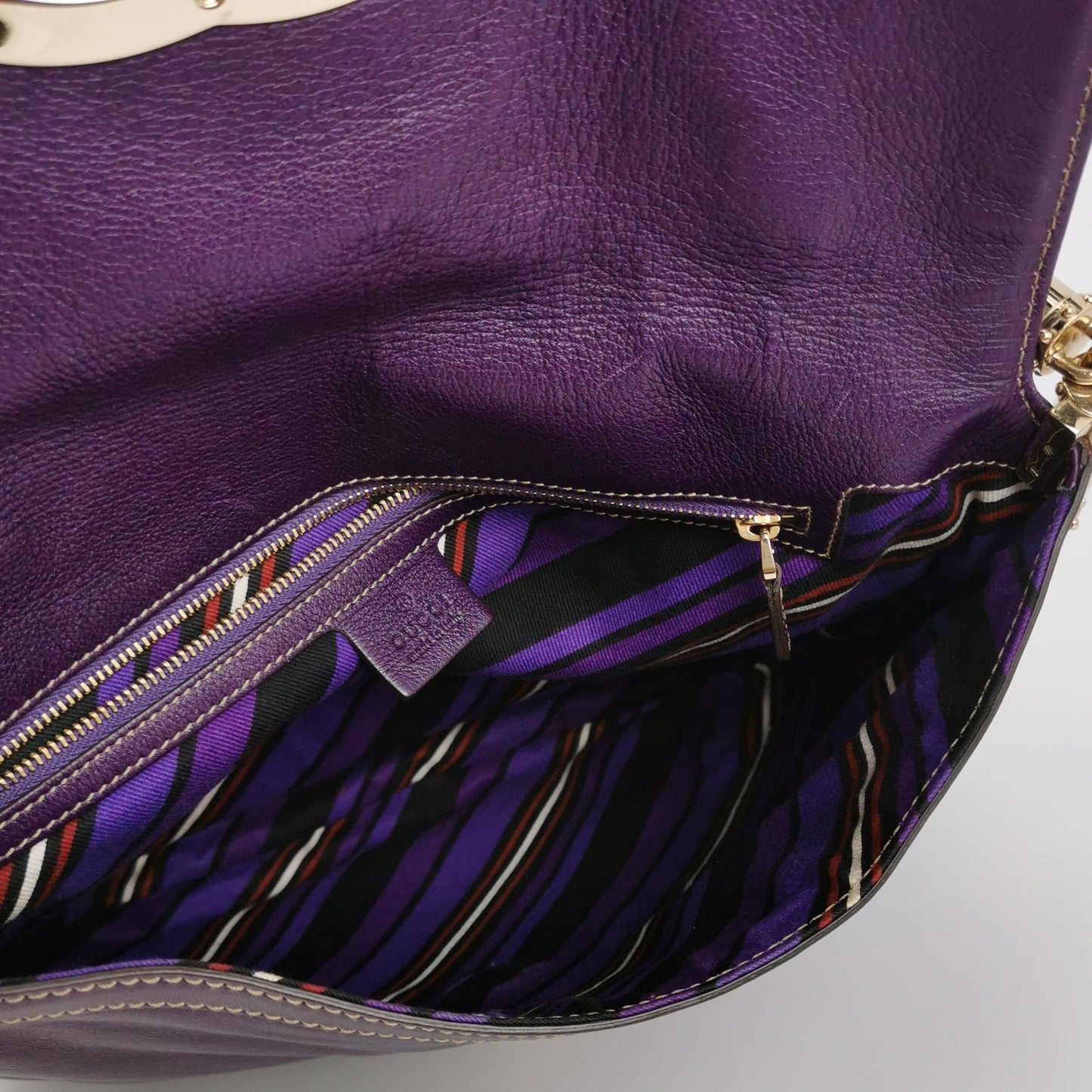 Preloved Gucci Britt Leather Shoulder Bag with Fringe and GG Logo 250521781201751