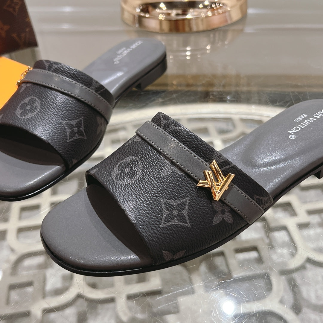 Louis Vuitton sandal isola flat mule black monogram calfskin