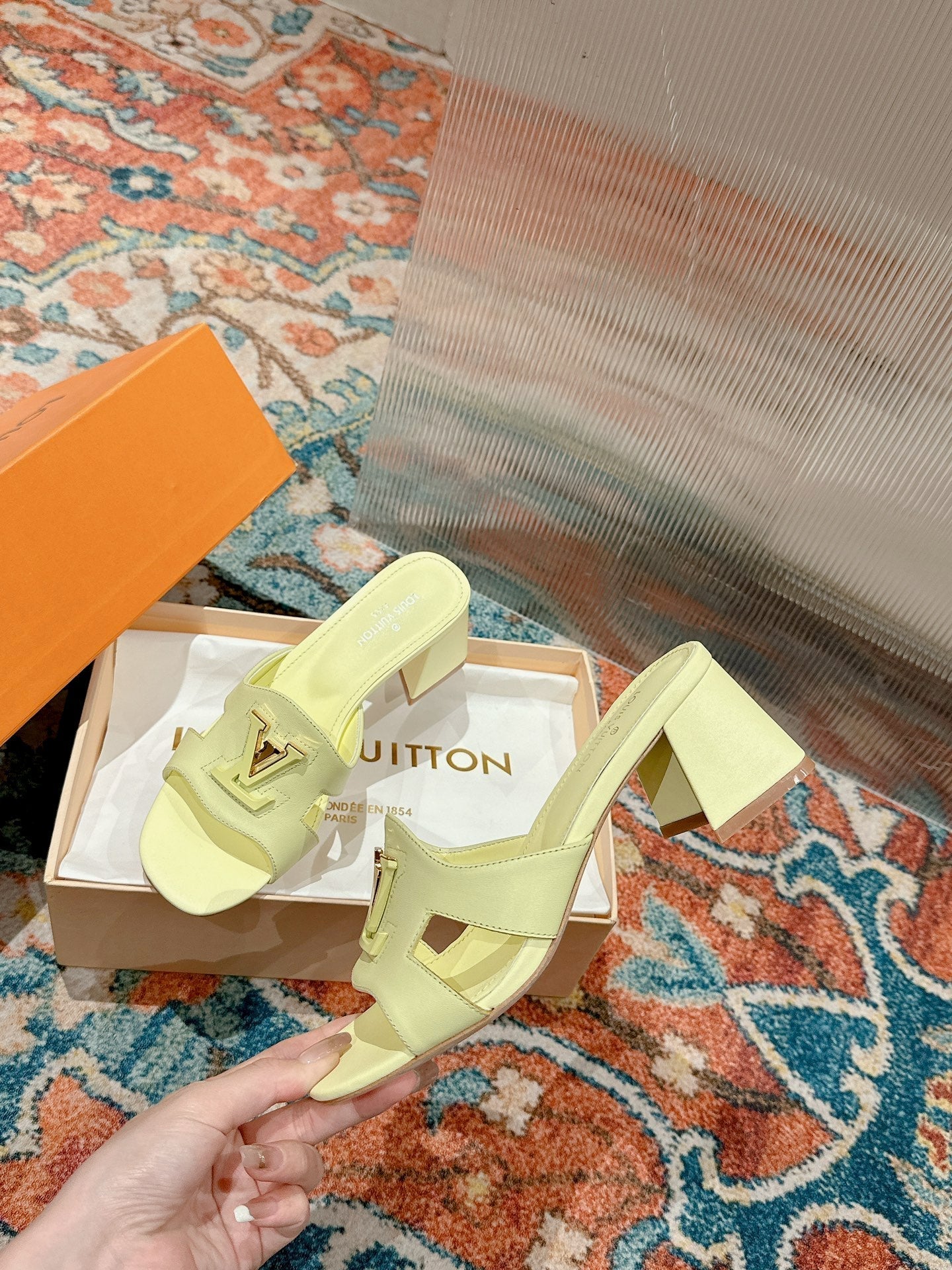 Louis Vuitton capri mule 45mm pastel yellow calfskin