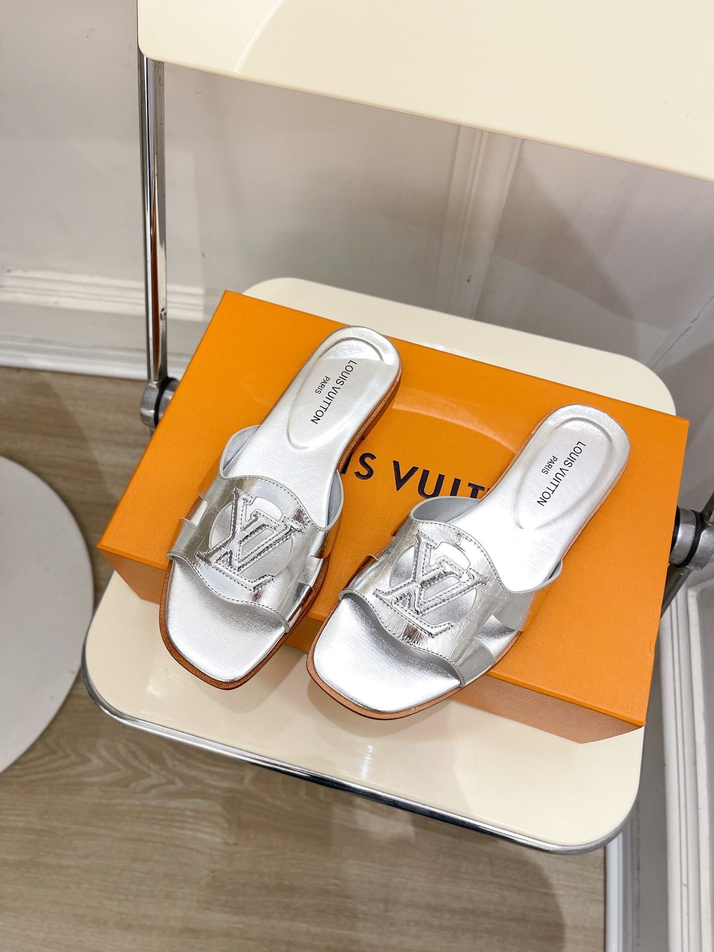 Louis Vuitton isola flat mule silver metalic calfskin