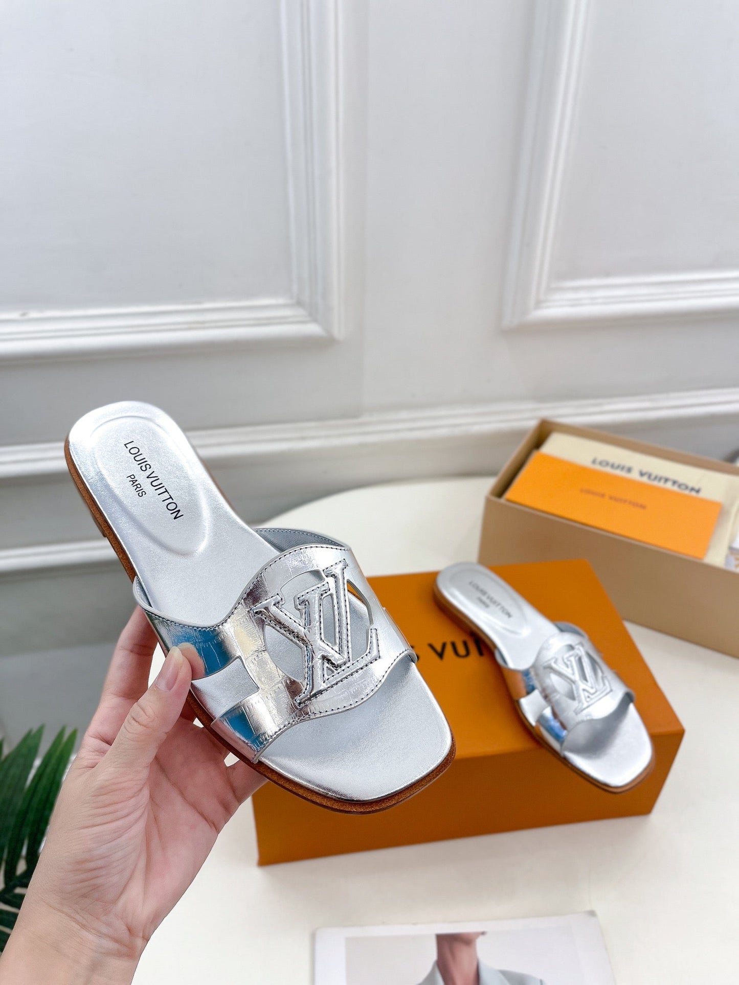 Louis Vuitton isola flat mule silver metalic calfskin