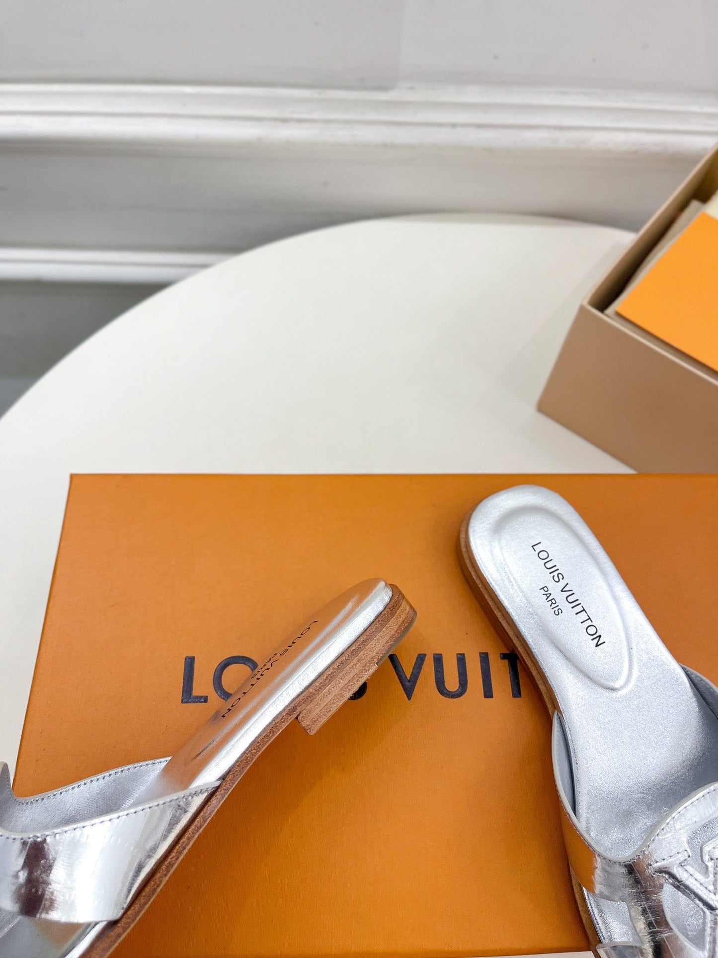 Louis Vuitton isola flat mule silver metalic calfskin