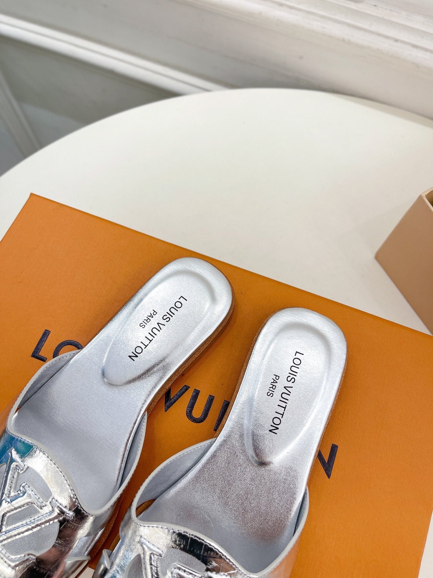 Louis Vuitton isola flat mule silver metalic calfskin