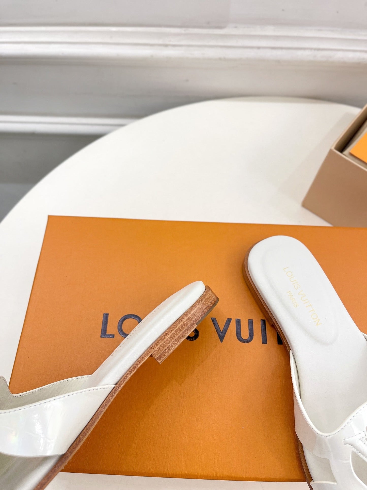 Louis Vuitton isola flat mule white calfskin