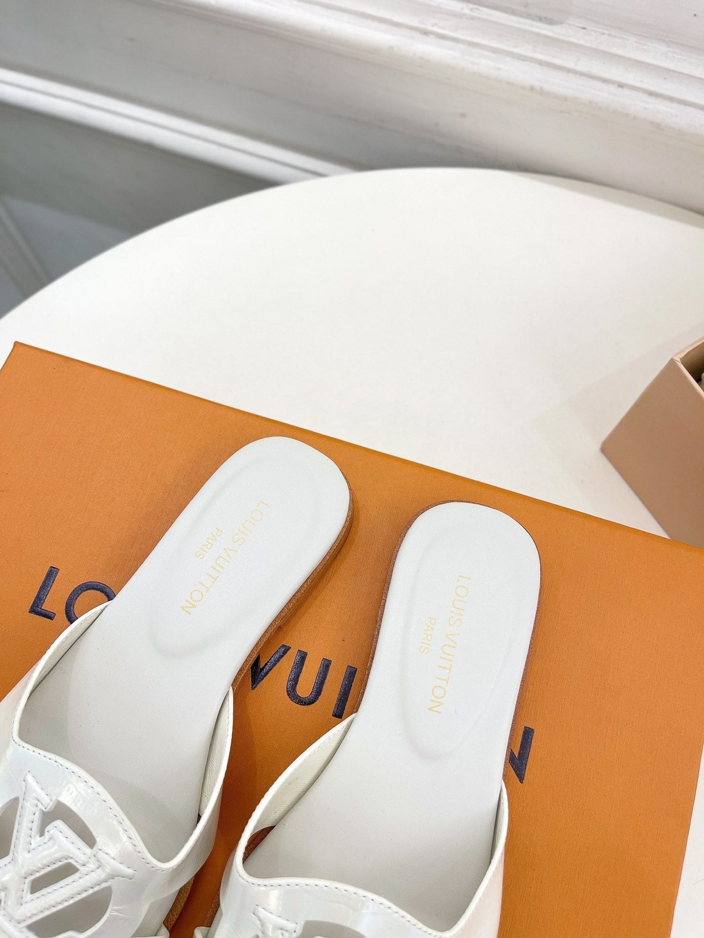 Louis Vuitton isola flat mule white calfskin