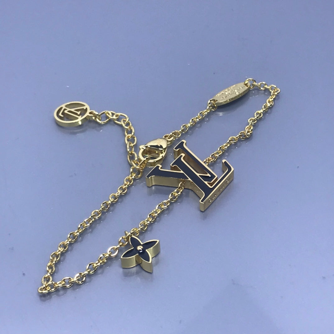 Louis Vuitton MONOGRAM PINK AND BLACK GOLD BRACELET
