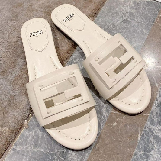 FENDI FENDI BAGUETTE SLIDES IN WHITE LAMBSKIN