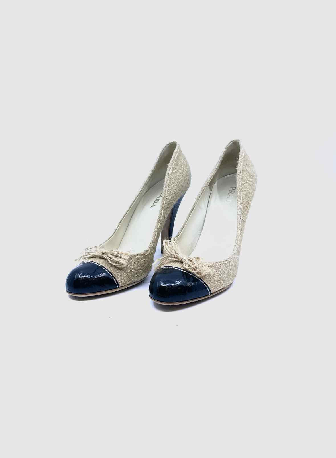 PRADA Size 9 Black, beige Canvas Solid Pumps