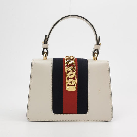 Preloved Gucci Sylvie Mini Leather Crossbody Bag with Metal Buckle and Webbing Strap 250513781190148