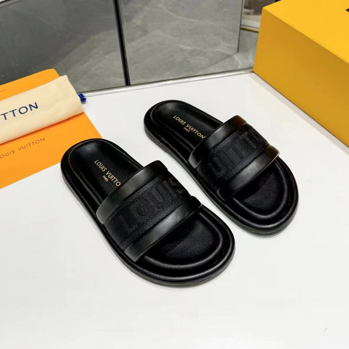 Louis Vuitton bliss flat mule black canvas calfskin