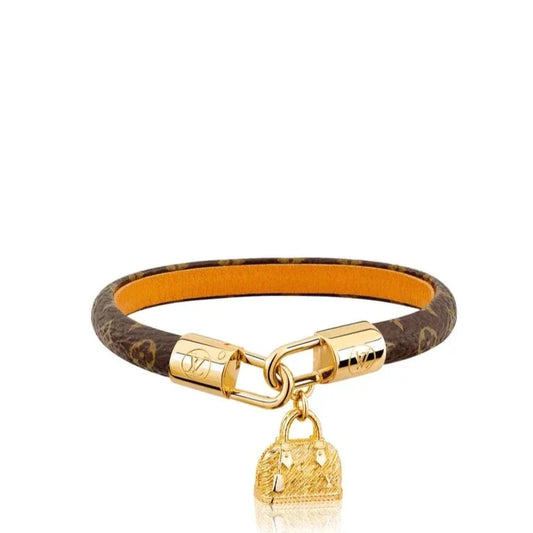 Louis Vuitton ALMA PINK GOLD CANVAS